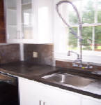 Kitchen facing rear of building